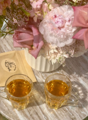 Tea served with fresh flowers